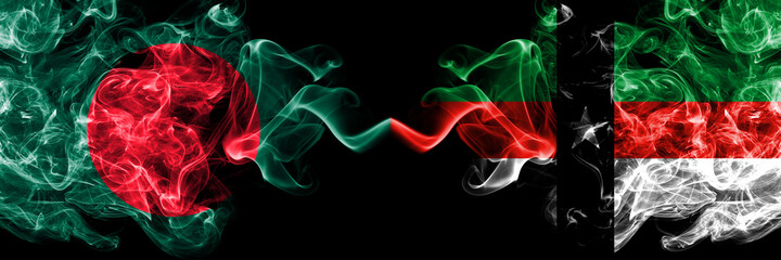 Bangladesh, Bangladeshi vs United States of America, America, US, USA, American, Denison, Texas smoky mystic flags placed side by side. Thick colored silky abstract smokes flags.
