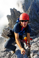 Alpinist on Koenigsjodler route, Austria, Europe