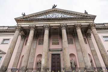 Fototapeta na wymiar Neo-classical building of Berlin State Opera (from 1743) in Unter den Linden street. Berlin, Germany.
