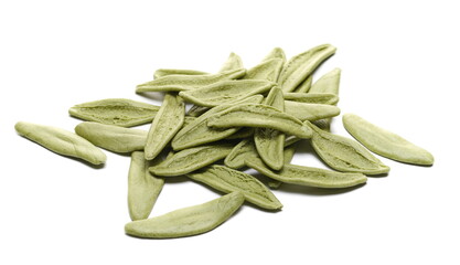 Olive leaf pasta (foglie d'ulivo), dried durum pasta with spinach isolated  on white background
