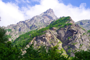 Fototapeta na wymiar Mountain rocky peaks in the Cherek gorge