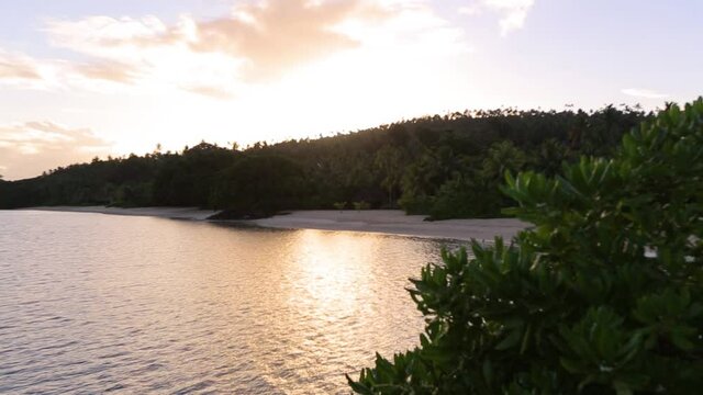 Image of tropical beach at Fiji island during sunset.