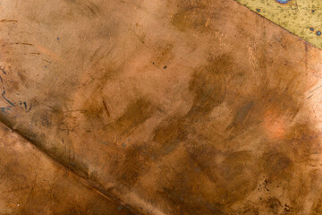 Stained copper bronze metal sheet as grunge background