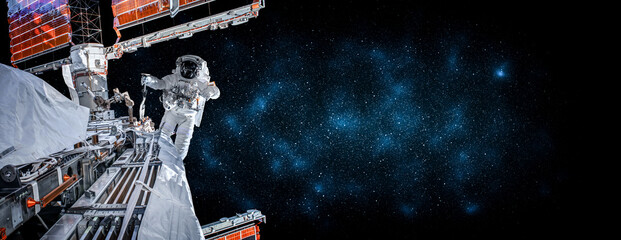 Astronaut spaceman do spacewalk while working for space station in outer space . Astronaut wear full spacesuit for space operation . Elements of this image furnished by NASA space astronaut photos. © InfiniteFlow
