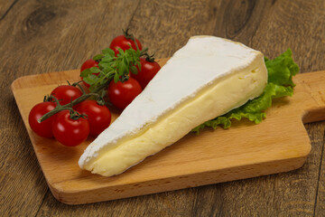 Brie cheese triangle served salad