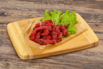 Raw beef meat sliced for cooking
