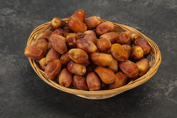 Sweet tasty dry dates in the basket