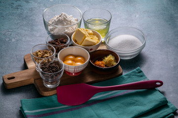 cake ingredients, egg yolks egg whites; chocolate, flour, sugar, walnuts, butter, lemon zest, orange zest, raisins