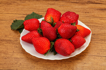 Ripe sweet strawberry with leaf