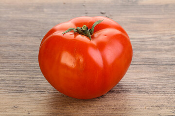 Red ripe big tomato isolated