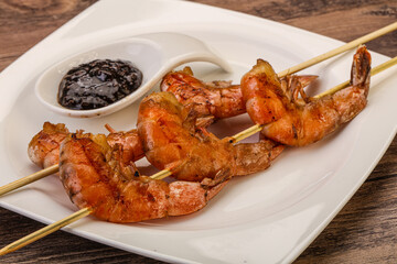Grilled prawn skewer with pepper sauce