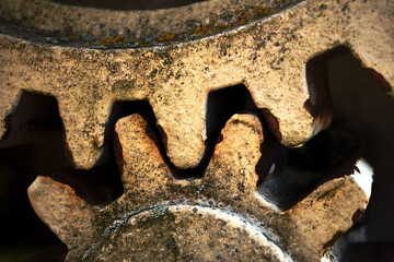 Two interlocking gears, part of a gear system for regulating and controlling a weir at the mouth of the Oker River on the Aller River in Mueden, Germany.