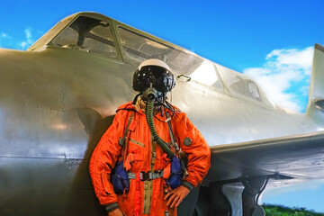 jet fighter pilot helmet. dummy of an airplane pilot in a helmet and overalls against the...