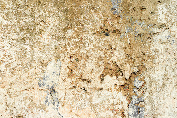 Texture of a concrete wall with cracks and scratches which can be used as a background