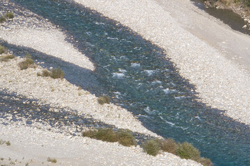 the Cinca river as it passes through the town of Ainsa, in the Aragonese Pyrenees, located in...