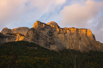 sunset in the meadow of the Ordesa y Monte Perdido National Park, in the Aragonese Pyrenees,...