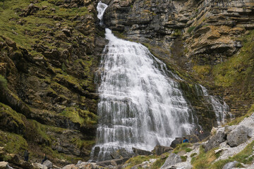 Fototapeta na wymiar Cola de Caballo waterfall in Ordesa y Monte Perdido National Park, in the Aragonese Pyrenees, located in Huesca, Spain.