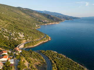 Scenic view of the coastline of croatia in the summer with mountains and blue sea