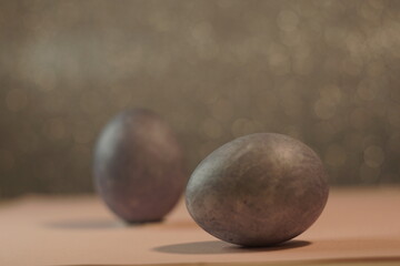 stylish gray marble eggs painted for easter, place for text