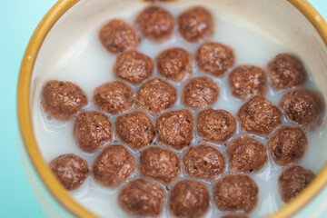 Chocolate cereal with milk. top view.