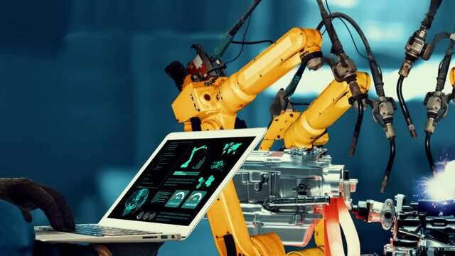 Smart industry robot arms modernization for innovative factory technology . Concept of automation manufacturing process of Industry 4.0 or 4th industrial revolution and IOT software control operation.
