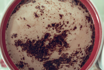 Coffee drink in a mug with milk, textured coffee stains. Fragrant coffee drink. texture.