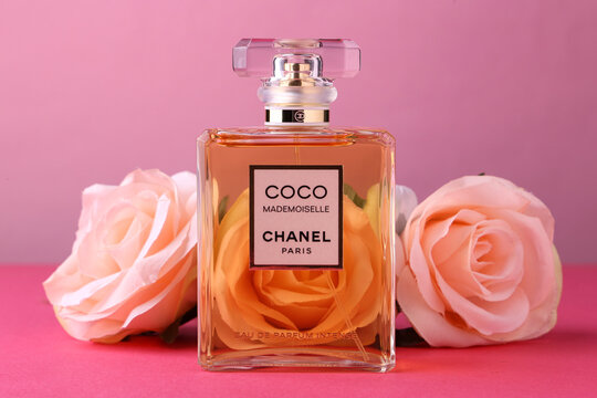 Jeddah Saudi Arabia March 31 2021 COCO chanel Floral scent concept. Perfume  bottle with lflowers over pink pastel background Flat lay and copy space  top view. Stock Photo