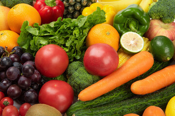 Fototapeta na wymiar Assorted fresh ripe fruits and vegetables. Food concept background.