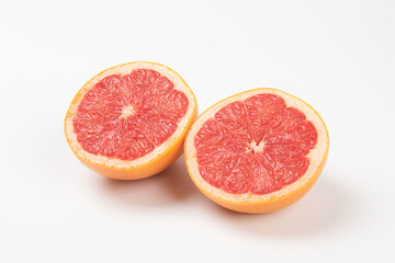 Fototapeta na wymiar grapefruit slice, half cut grapefruit on white background.