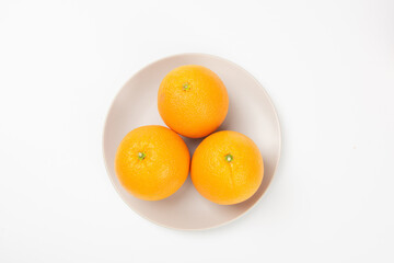 Fresh orange fruit isolated on white background
