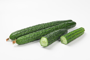 Fresh green cucumber on white background.
