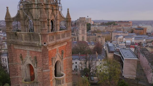 Aerial reveal of Wills Memorial building from Cabot Tower in Bristol, UK
