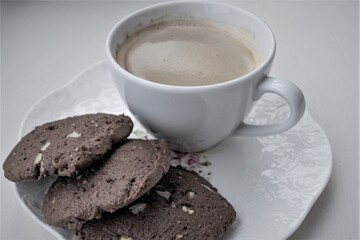 cup of coffee and cookies
