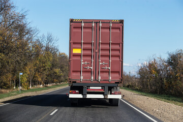 truck transports a sea freight container