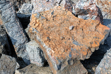 Close up view of the heap of the copper slag. Slag that is quenched in water produces angular...