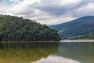 Fototapeta na wymiar Lake landscape in green and orange tones