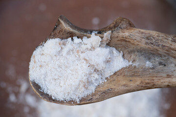 Sea salt on primitive spoon