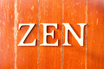 Alphabet letter in word zen on old red color wood plate background