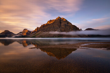A foggy morning at Bow lake, Canadian Rockies, Alberta, Canada