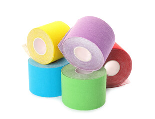 Many bright kinesio tape in rolls on white background