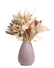 Beautiful dried flower bouquet in ceramic vase isolated on white © New Africa