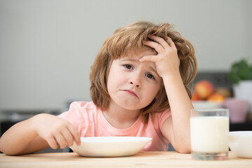 Not hungry. Kid refusing to eat. Child have no appetite. Upset little kid refuse to eat organic...