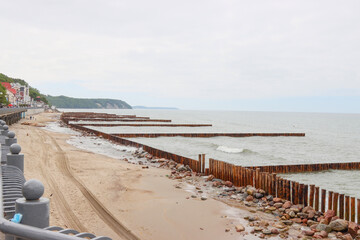 Breakwaters on the promenade beach of the city of Svetlogorsk, Russia.