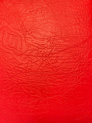 red skin texture as background.