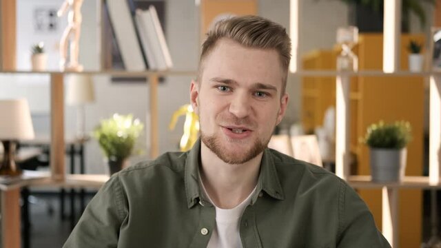 Portrait of a young handsome man. Remote communication of happy multiracial young friends. Webcam view. College students listening to online lesson. Business chat conference talking with tutor.