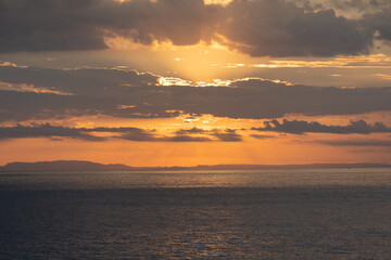 Beautiful colors of a sunset in the pacific ocean in the magical beaches of Costa Rica