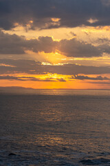 Fototapeta na wymiar Beautiful colors of a sunset in the pacific ocean in the magical beaches of Costa Rica