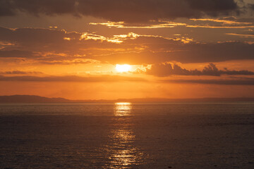 Beautiful colors of a sunset in the pacific ocean in the magical beaches of Costa Rica