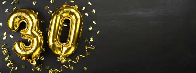 gold foil balloon number thirty. Birthday or anniversary greeting card with the inscription 30....
