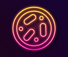 Glowing neon line Petri dish with bacteria icon isolated on black background. Vector